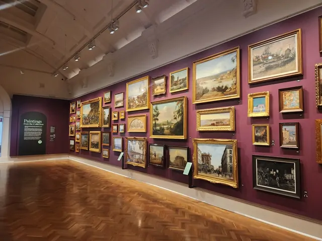 Gold-framed paintings on purple walls in a classic art gallery.