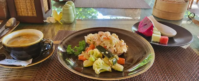 A final breakfast of shrimp salad, fruit, and coffee.