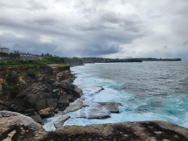 Rough seas battering the cliffs near Bondi Beach.