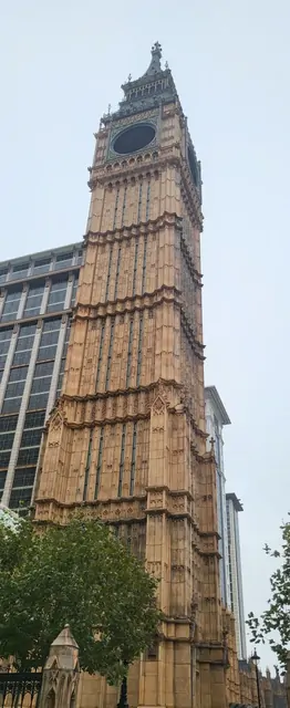 A low-angle view of the Gothic stone architecture of the Big Ben replica.