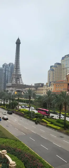 The Eiffel Tower replica and palm-lined roads at the Parisian resort.