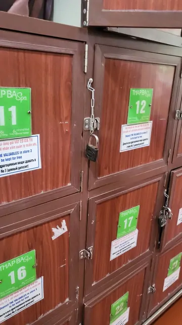 Wooden lockers with locks inside Thapba Spa.