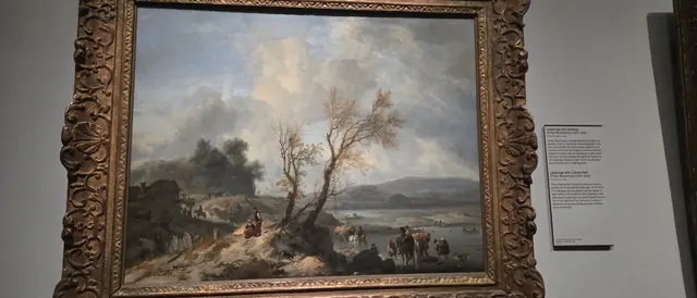 A 17th-century sandy landscape by Philips Wouwerman in a golden frame.